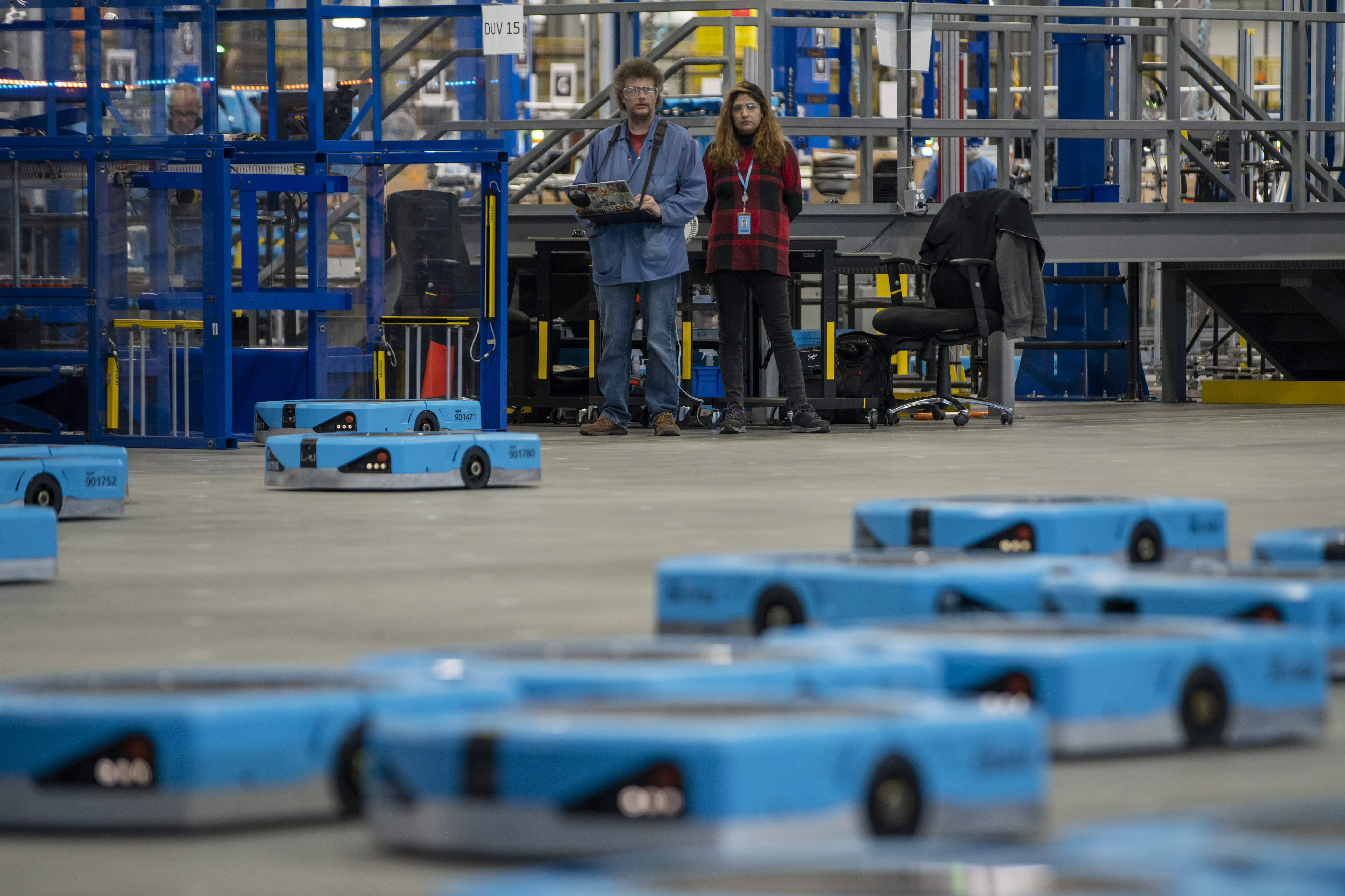 Amazon Hercules robots are tested during the Delivering the Future event at the Amazon Robotics Innovation Hub in Westborough, Massachusetts, US, on Thursday, Nov. 10, 2022. The event offers an overview of the innovations Amazon sees the potential to scale and create lasting impact for the future of delivery. Photographer: M Scott Brauer/Bloomberg via Getty Images