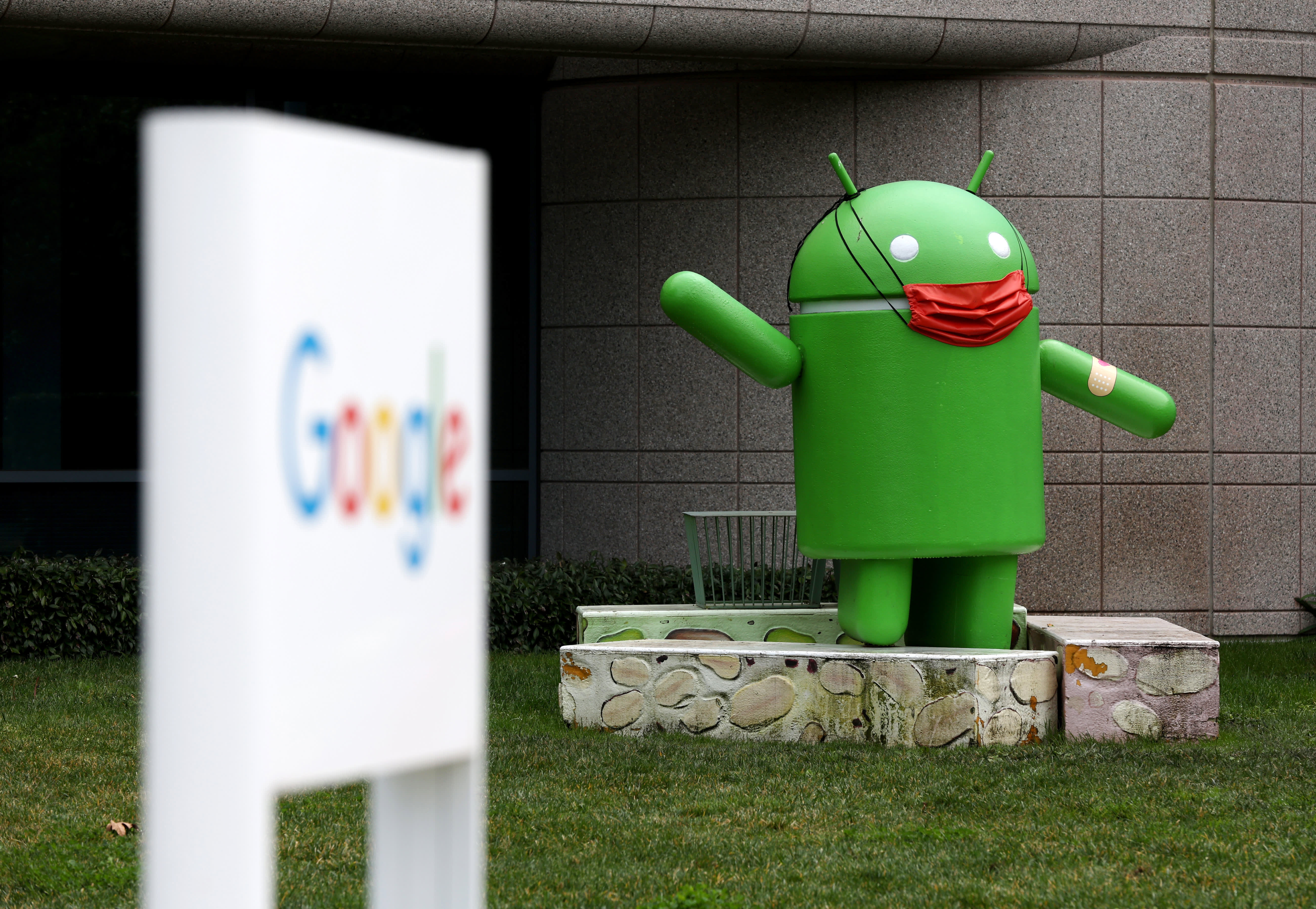 An Android statue is displayed in front of a building on the Google campus on January 31, 2022 in Mountain View, California. Google parent company Alphabet will report fourth quarter earnings on Tuesday after the closing bell.